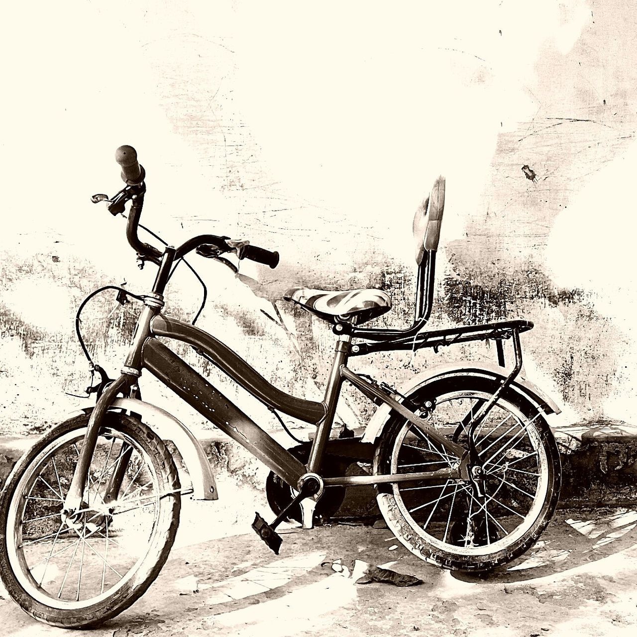 BICYCLES PARKED AGAINST WATER