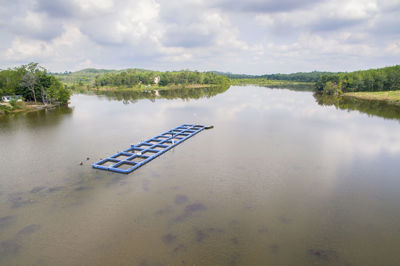 Reflection of clouds in calm lake