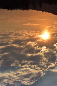 Scenic view of dramatic sky during sunset
