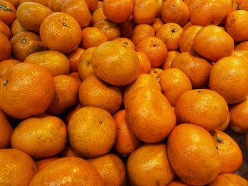 Full frame shot of oranges at market stall