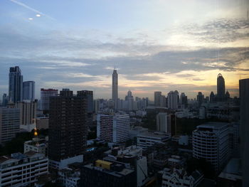 High angle view of buildings against sky during sunset