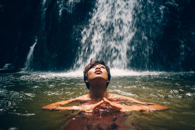 Beautiful woman swimming in water