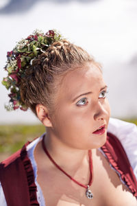 Close-up young woman looking away