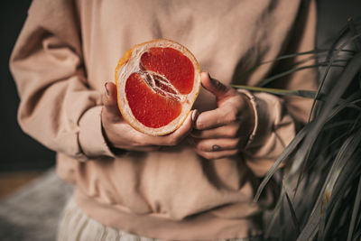 Close-up of woman holding ice cream