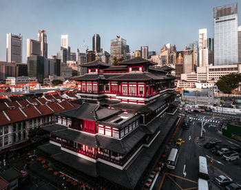 High angle view of buildings in city against sky