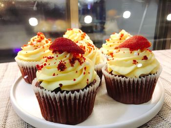 Close-up of cupcakes on table