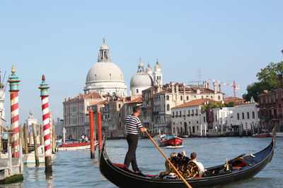 Panoramic view of boats in canal