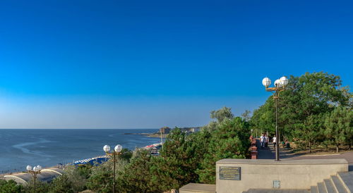 Scenic view of sea against blue sky