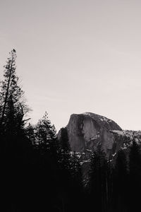 Low angle view of mountain against clear sky