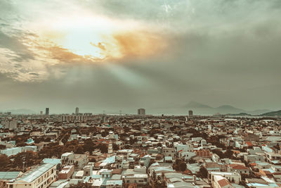 High angle view of townscape against sky at sunset