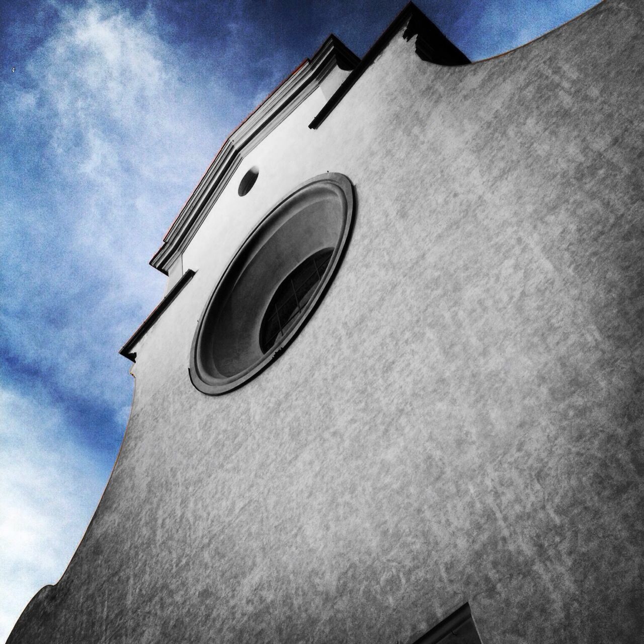 low angle view, building exterior, architecture, built structure, sky, part of, blue, tower, day, outdoors, cloud, cropped, sunlight, no people, church, cloud - sky, building, religion, close-up