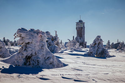 Panoramic view of land against clear sky during winter