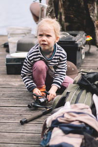 Full length of man sitting in car