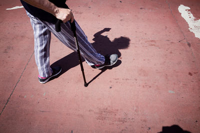 Low section of man on footpath