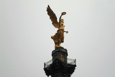 Low angle view of statue against clear sky