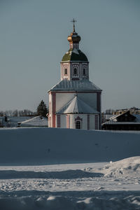 Built structure on snow covered landscape