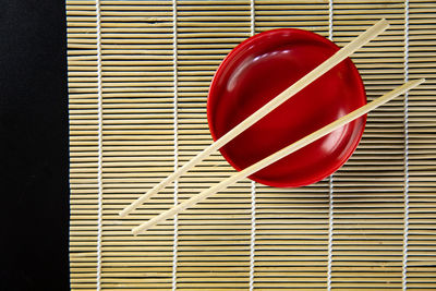High angle view of red balloon on table
