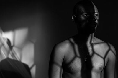 Portrait of young man looking away