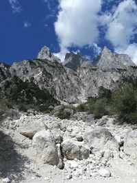Rock formations on landscape against sky