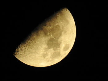 Low angle view of moon against sky at night