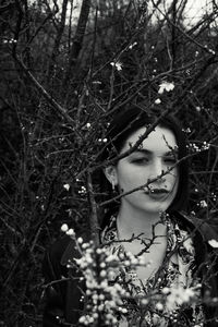 Portrait of woman on plant