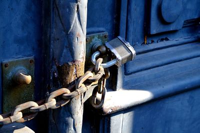 Close-up of padlock on door