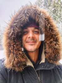 Portrait of smiling man during winter