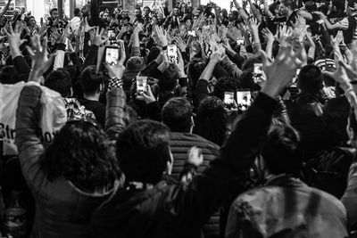 Crowd enjoying in music concert