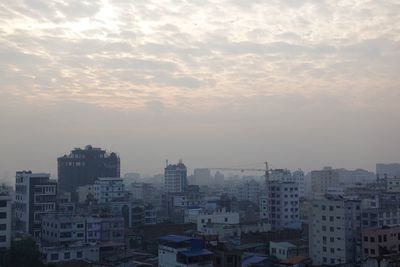 High angle view of buildings against sky during sunset