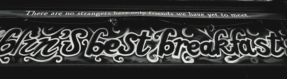 Close-up of text on wall