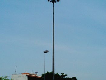 Low angle view of street light against clear blue sky