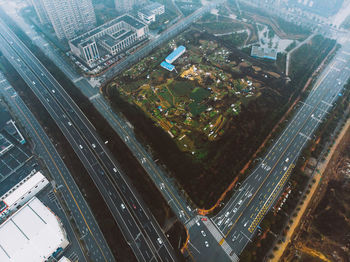 High angle view of road amidst buildings in city