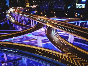 High angle view of light trails on bridge