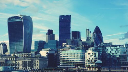 Low angle view of tall buildings against the sky