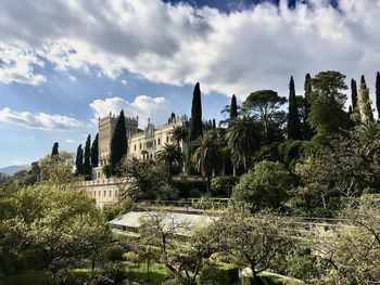 Buildings in city against sky