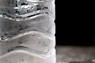 Close-up of water drops on table