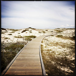 View of wooden footbridge