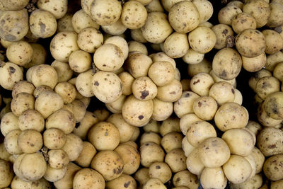 Full frame shot of onions for sale at market