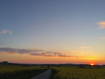 Road passing through field