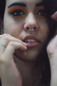 Close-up portrait of young woman