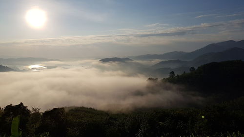 Scenic view of mountains against sky during sunset