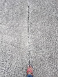 Low section of woman on floor