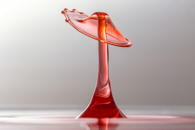 Close-up of water splashing against white background