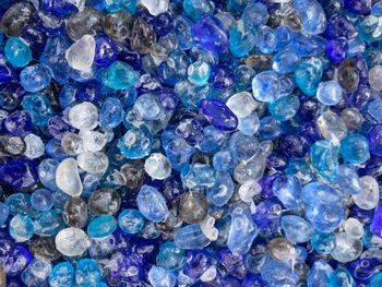 Top down perspective of blue iridescent glass stones