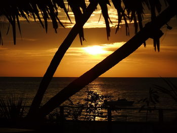 Scenic view of sea at sunset