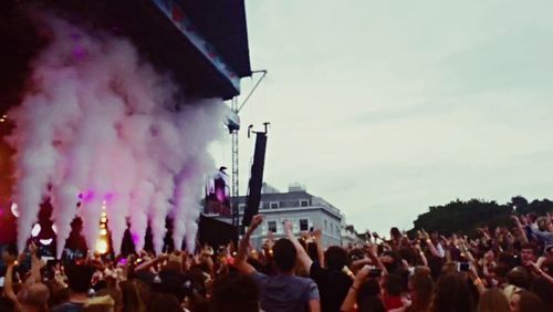 Group of people in front of crowd