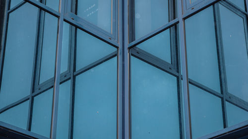 Low angle view of glass window