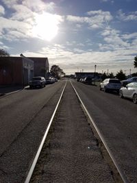 Highway in city against sky