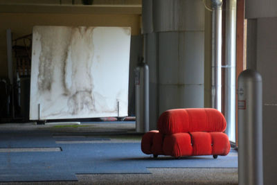 Empty chair by window at home