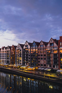 Illuminated buildings in water
